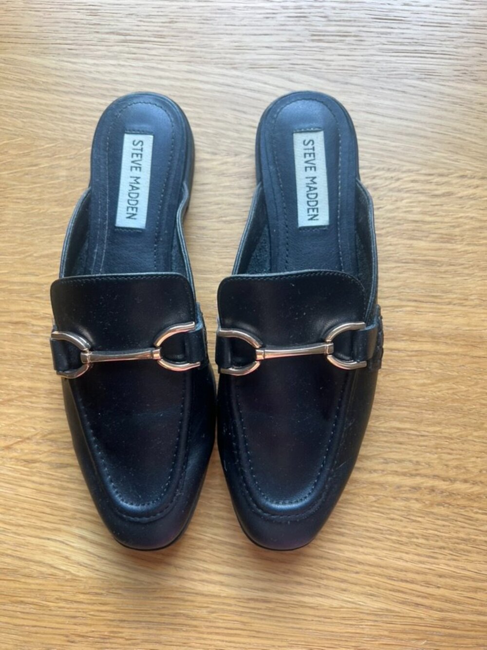 Black Steve Madden mules, size 6